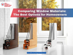 Three window frame samples made of vinyl, wood, and composite materials displayed indoors in front of a double-pane window.