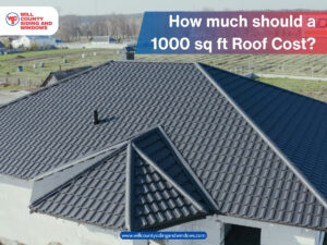 Newly installed dark gray roof on a home with caption “How much should a 1000 sq ft roof cost?” by Will County Siding and Windows.