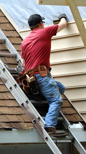 man installing siding in joliet illinois